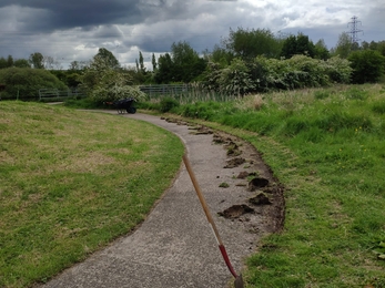 Tidying path edges at Bog Meadows 