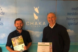 Chaka Travel receiving their corporate membership certificate