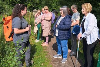 Jessica leading a wellbeing session at Bog Meadows Nature Reserve