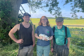 Adam and Jack Kelly with Katy Bell from Ulster Wildlife