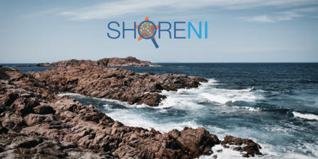 A rocky shore with the ShoreNI logo